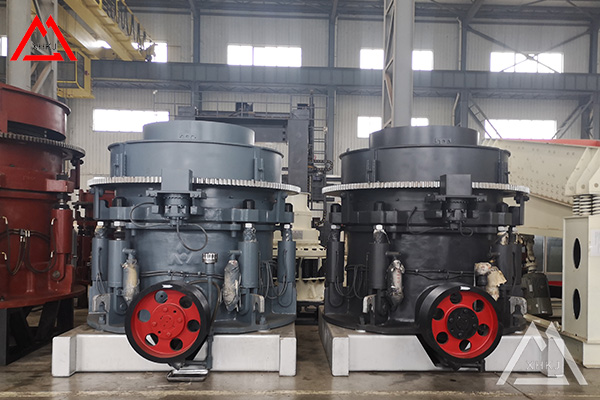 What is the function of the hydraulic system of the hydraulic cone crusher